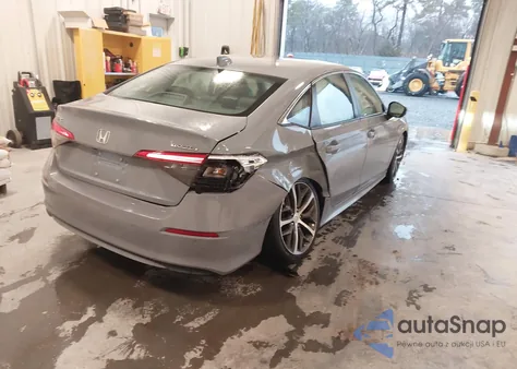 2022 Honda Civic Touring from USA, damaged, VIN 2HGFE1F93NH320098